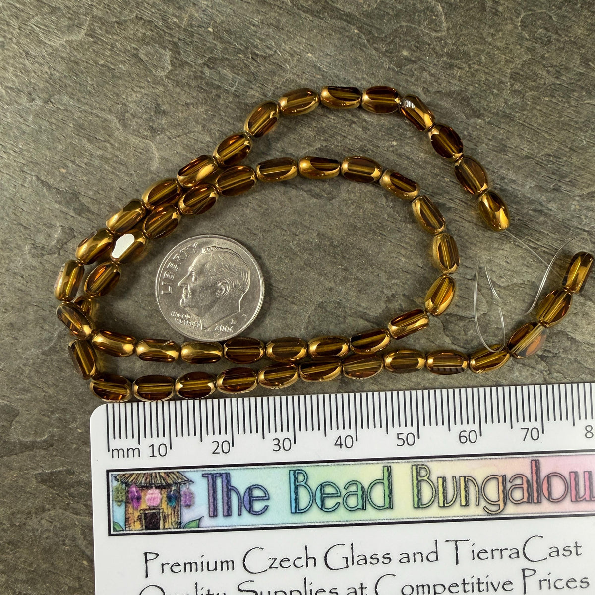 Electroplated Glass Beads - 7x4.5mm Faceted Oval, Transparent Brown with Gold Finish (A01-01E) * Qty. 50 Beads