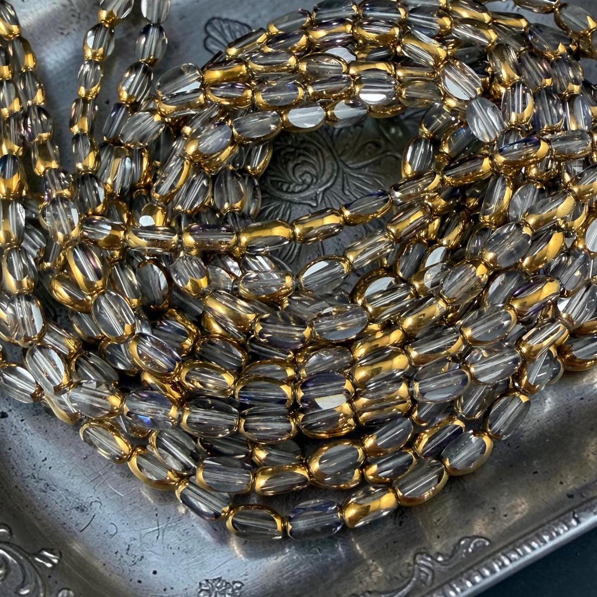 Electroplated Glass Beads - 7x4.5mm Faceted Oval, Transparent Clear with Gold Finish (A01-01A) * Qty. 50 Beads