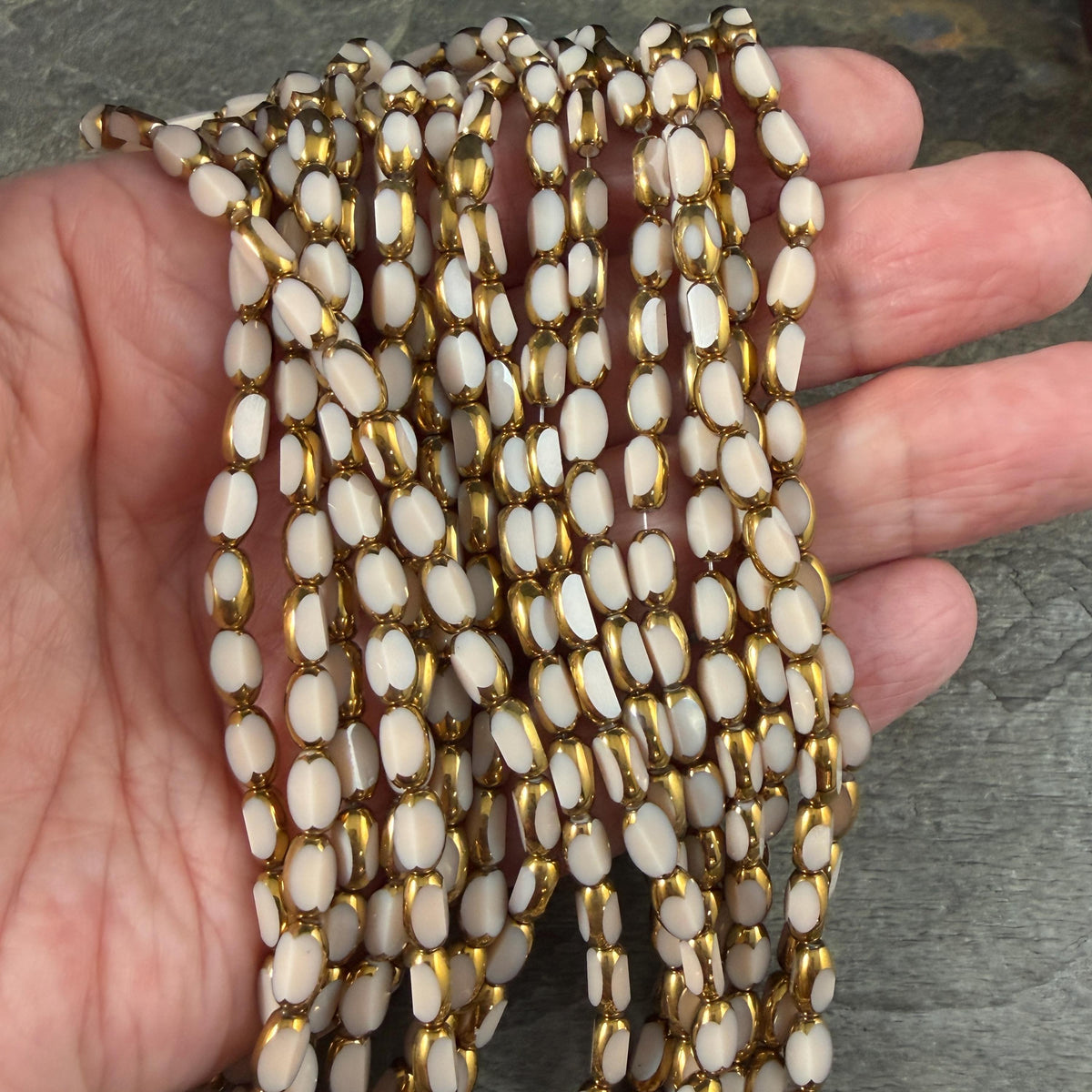 Electroplated Glass Beads - 7x4.5mm Faceted Oval, Opaque Ivory Beige with Gold Finish (A01-02J) * Qty. 50 Beads