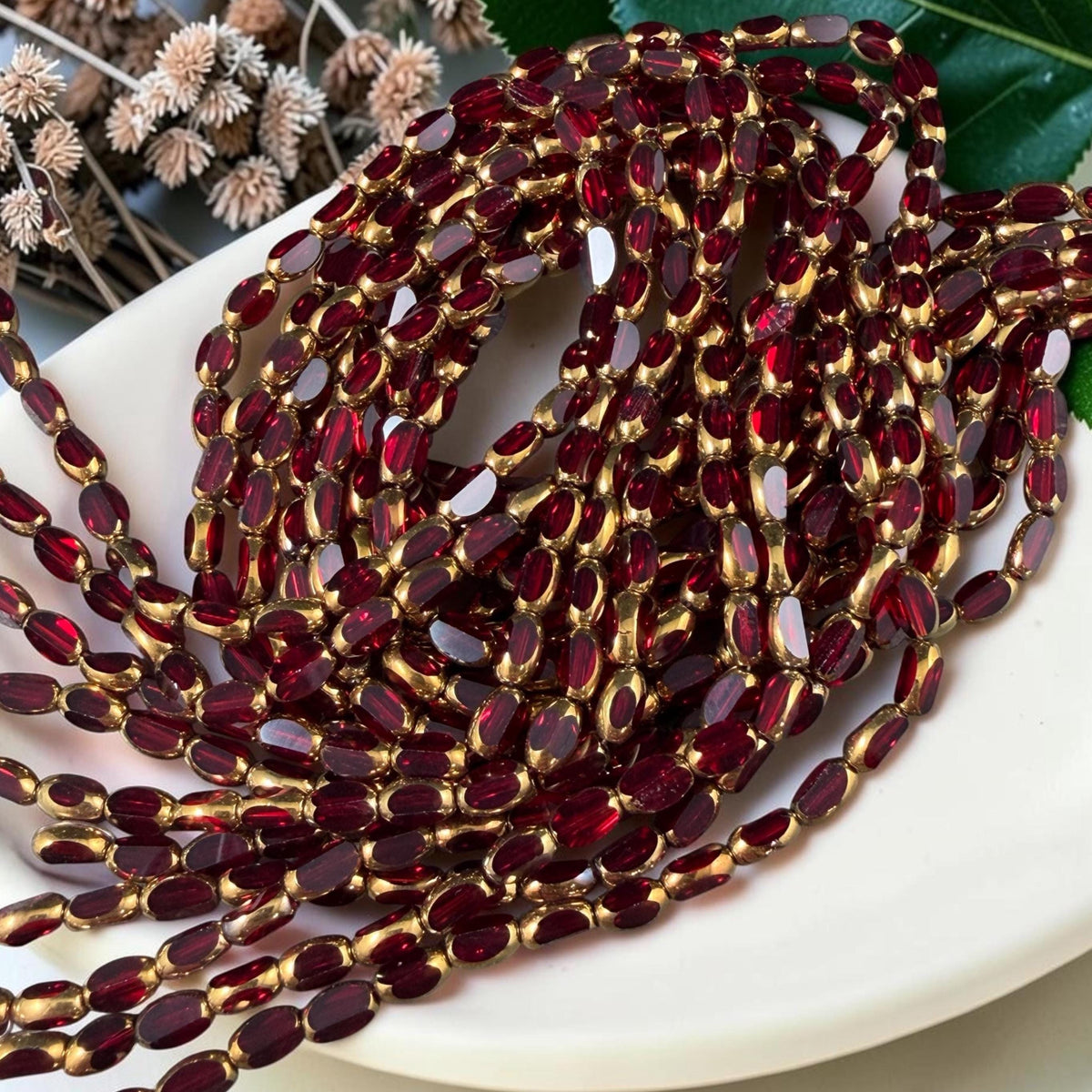 Electroplated Glass Beads - 7x4.5mm Faceted Oval, Transparent Red with Gold Finish (A01-02G) * Qty. 50 Beads