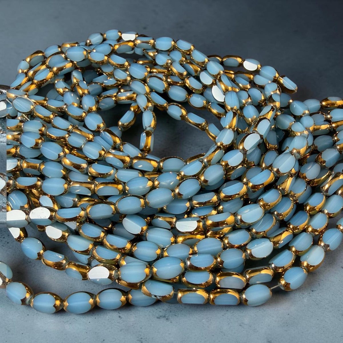 Electroplated Glass Beads - 7x4.5mm Faceted Oval, Opaque Cornflower Blue with Gold Finish (02B-02) * Qty. 50 Beads