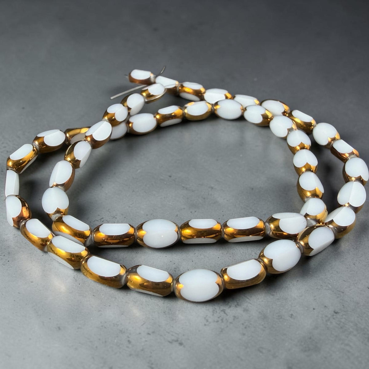 Electroplated Glass Beads - 7x4.5mm Faceted Oval, Opaque White with Gold Finish (02A-07) * Qty. 50 Beads