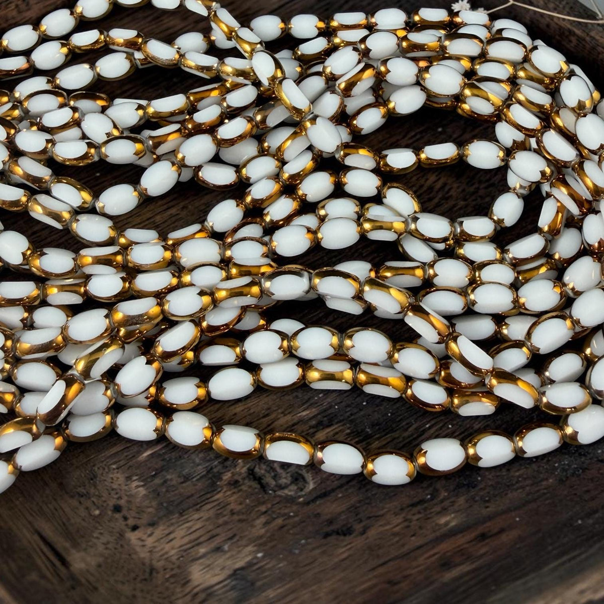 Electroplated Glass Beads - 7x4.5mm Faceted Oval, Opaque White with Gold Finish (02A-07) * Qty. 50 Beads