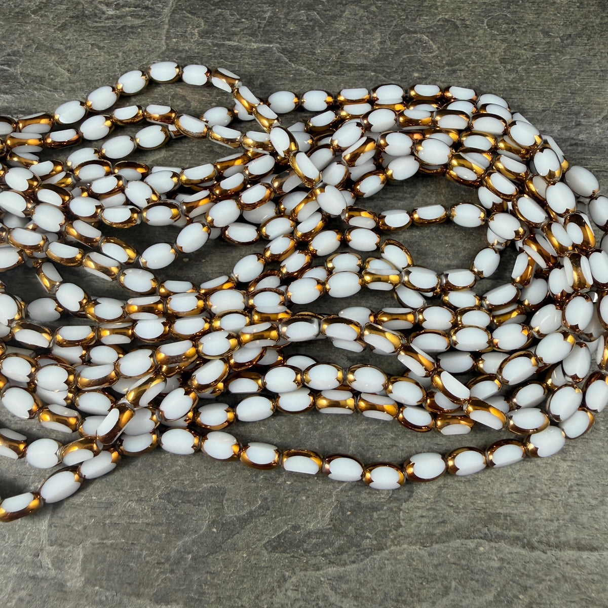 Electroplated Glass Beads - 7x4.5mm Faceted Oval, Opaque White with Gold Finish (02A-07) * Qty. 50 Beads
