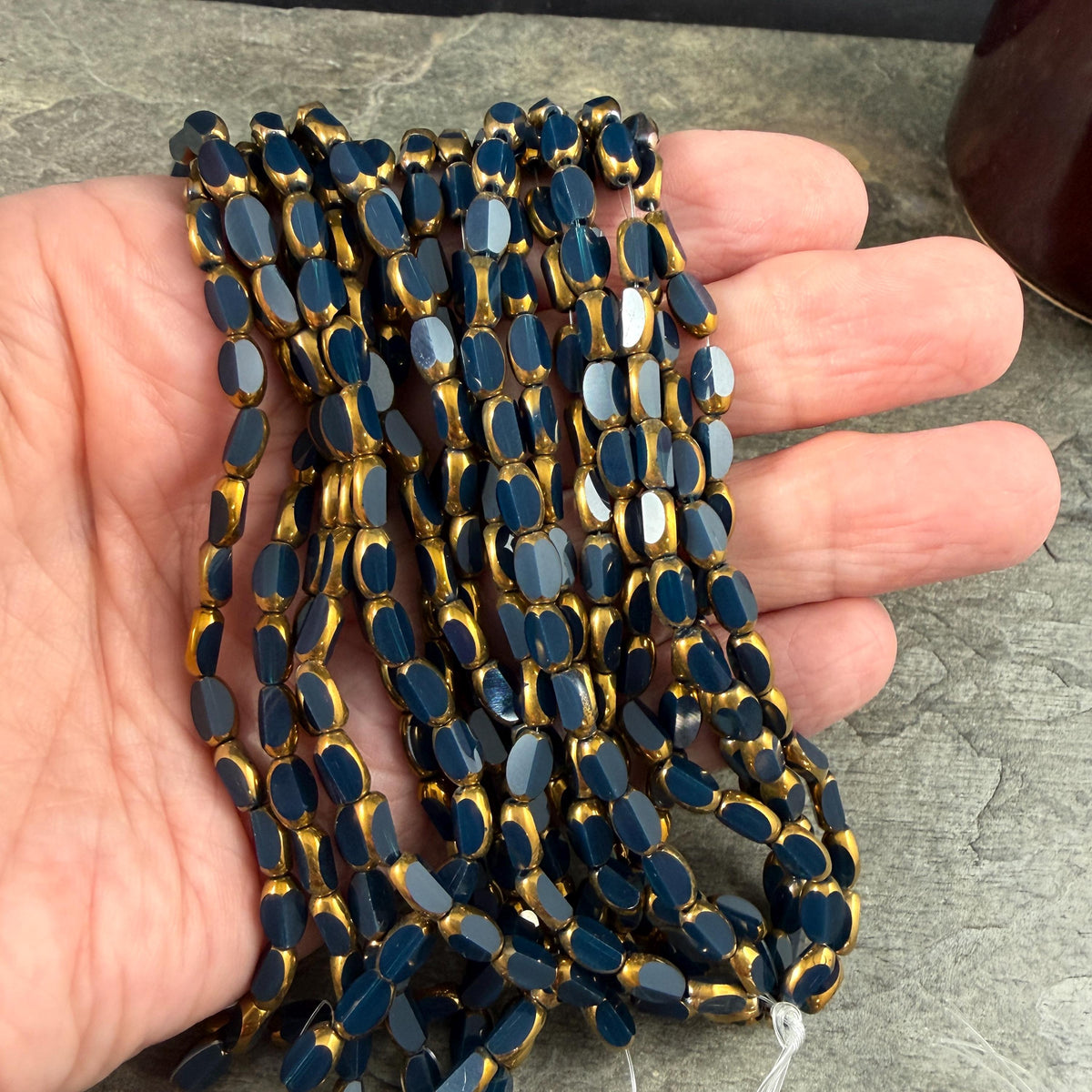Electroplated Glass Beads - 7x4.5mm Faceted Oval, Opaque Navy Blue with Gold Finish (02A-09) * Qty. 50 Beads