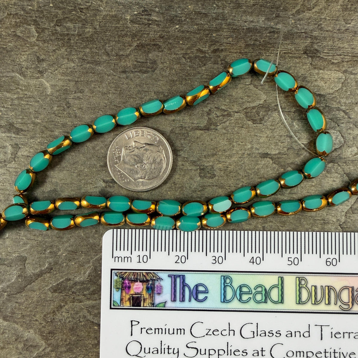 Electroplated Glass Beads - 7x4.5mm Faceted Oval, Opaque Dark Turquoise with Gold Finish (02A-04) * Qty. 50 Beads