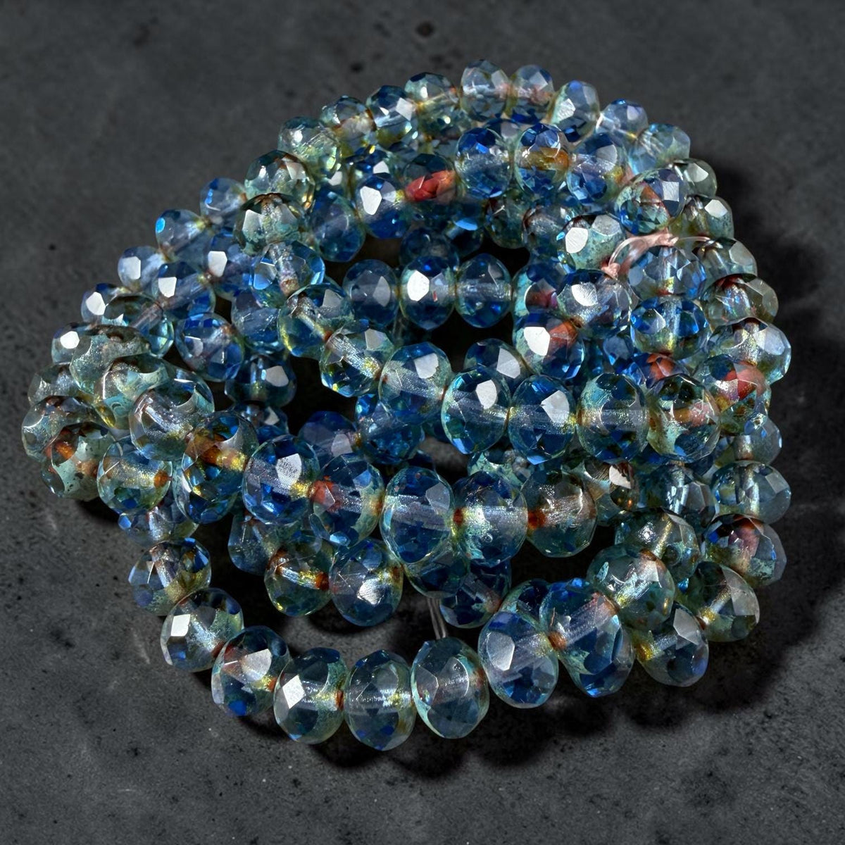 8x6mm Transparent Light Sapphire Blue Picasso Faceted Rondelles (R8/0577) *