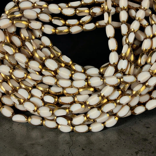 Electroplated Glass Beads - 7x4.5mm Faceted Oval, Opaque Ivory Beige with Gold Finish (A01-02J) * Qty. 50 Beads