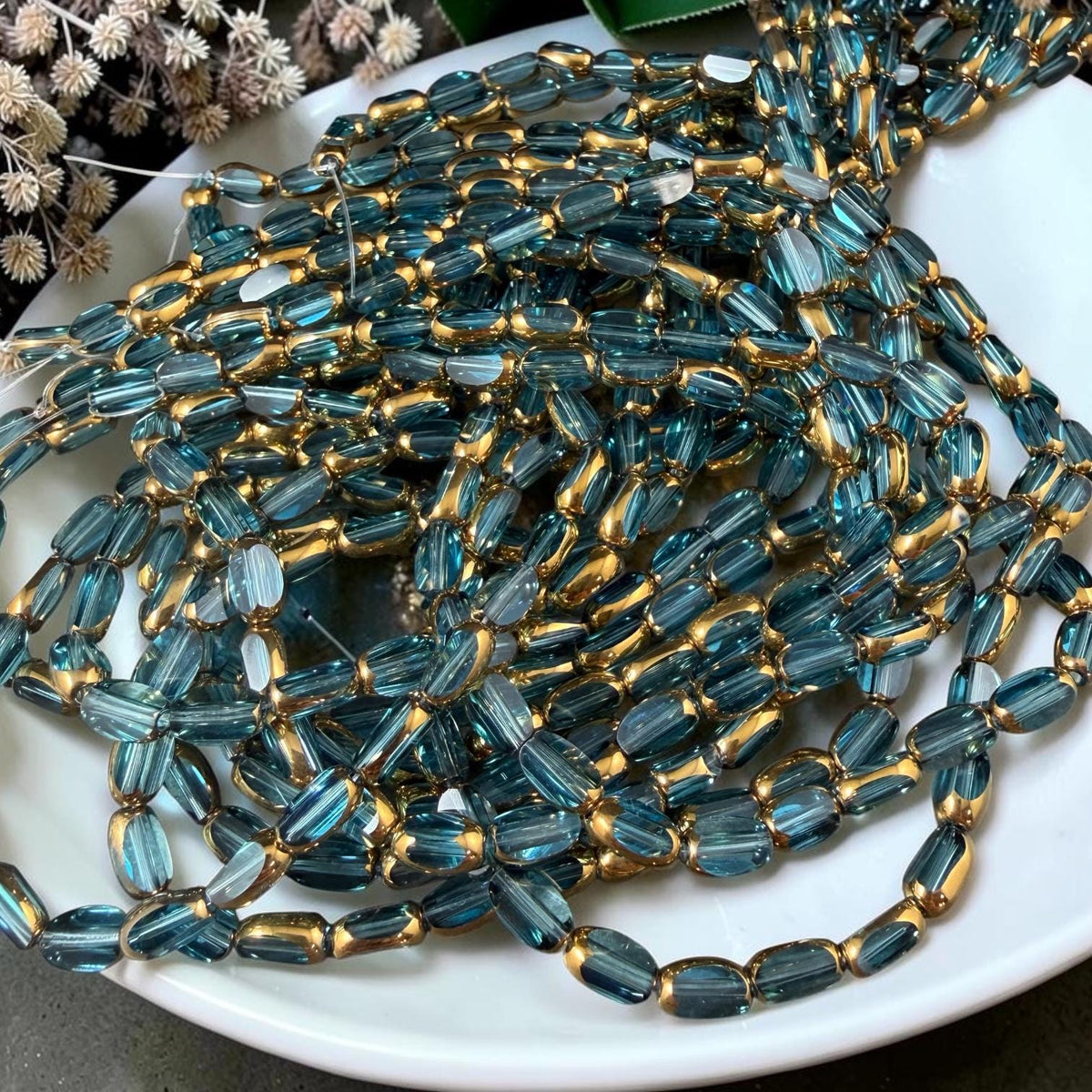 Electroplated Glass Beads - 7x4.5mm Faceted Oval, Transparent Lagoon Blue with Gold Finish (A01-01B) * Qty. 50 Beads