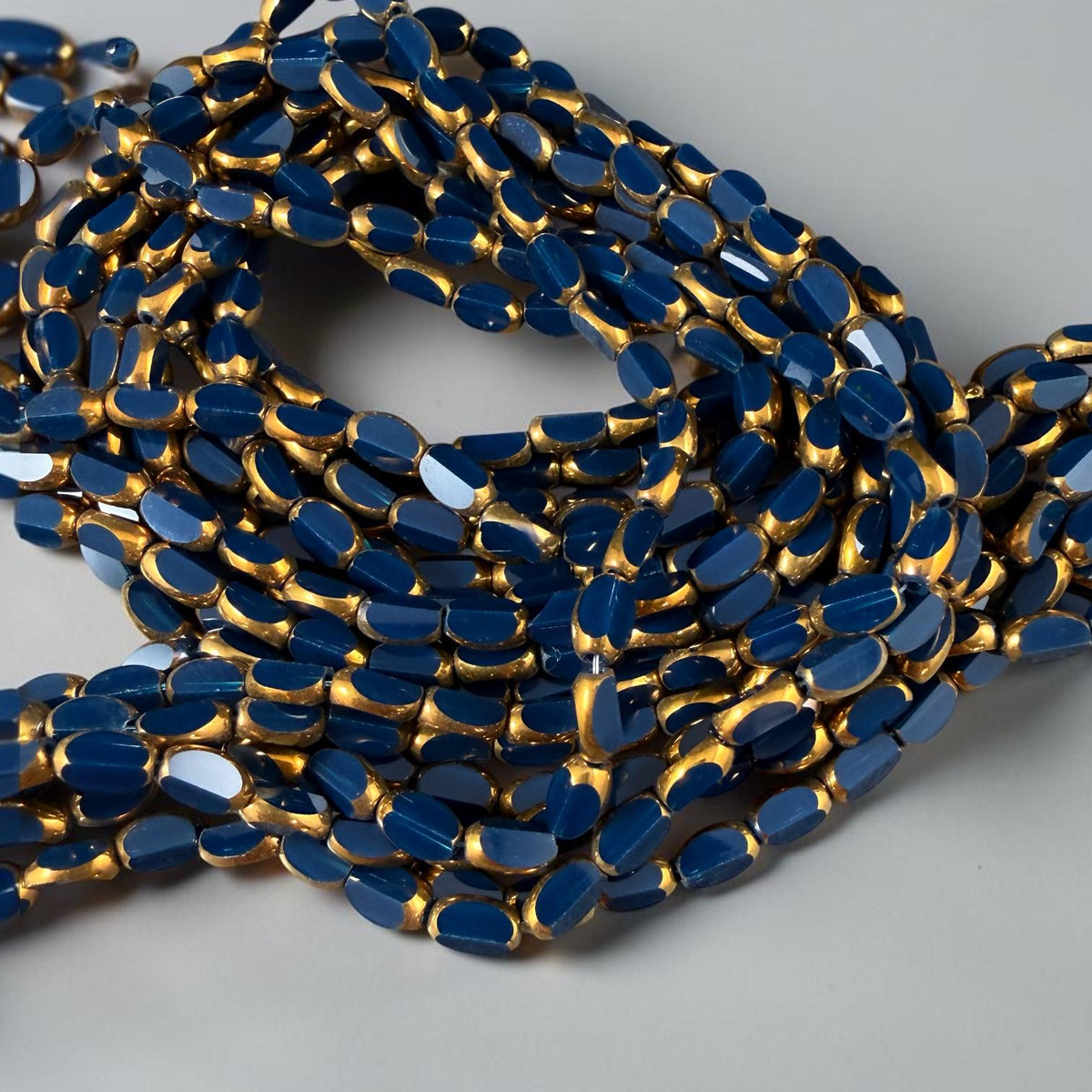 Electroplated Glass Beads - 7x4.5mm Faceted Oval, Opaque Navy Blue with Gold Finish (02A-09) * Qty. 50 Beads