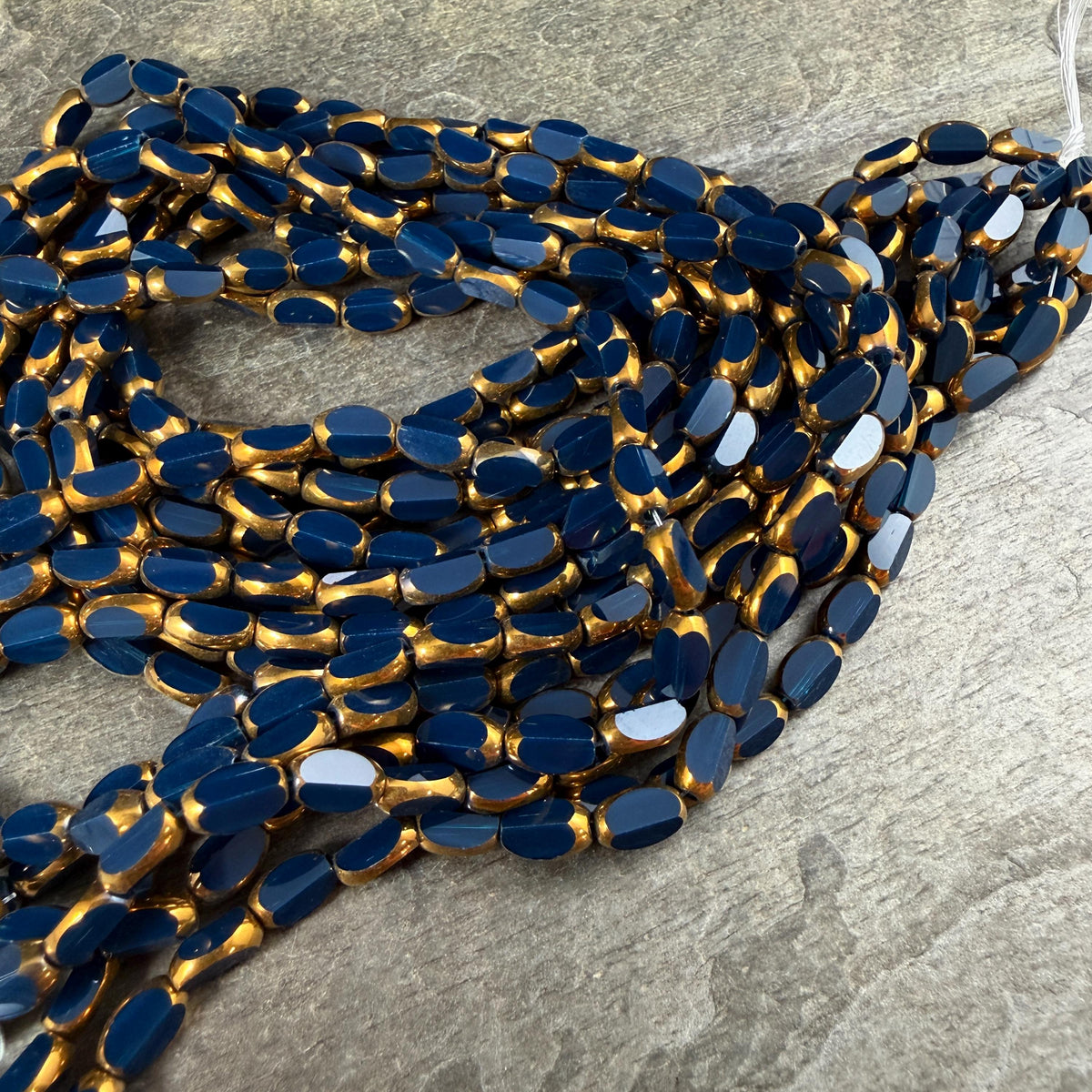 Electroplated Glass Beads - 7x4.5mm Faceted Oval, Opaque Navy Blue with Gold Finish (02A-09) * Qty. 50 Beads
