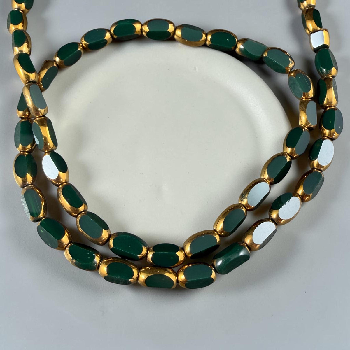 Electroplated Glass Beads - 7x4.5mm Faceted Oval, Opaque Evergreen with Gold Finish (02A-02) * Qty. 50 Beads