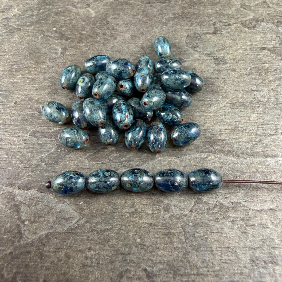 Czech Glass Beads - 9x6mm Olive Oval, Sapphire Blue Picasso (R964846) * 25 Beads