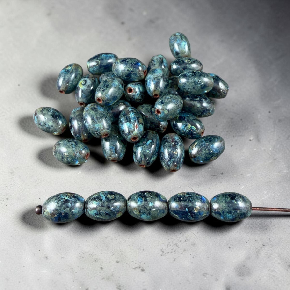 Czech Glass Beads - 9x6mm Olive Oval, Sapphire Blue Picasso (R964846) * 25 Beads