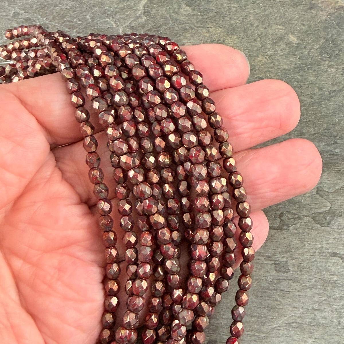 Czech Glass - 4mm Faceted Round Beads, Opaque Red with Bronze Picasso (FP4/SM-BT9320) * Qty 50