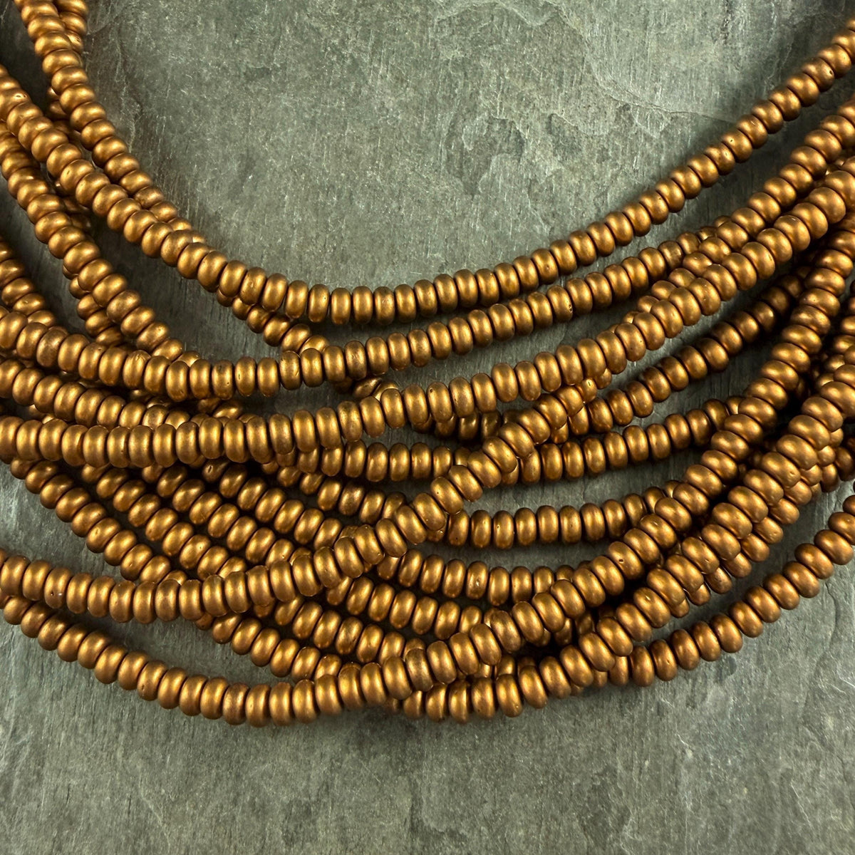 Czech Glass Beads - 4x2mm Heishi Rondelle, Matte Satin Antiqued Gold (RD4/SM-K0174) * Qty. 100