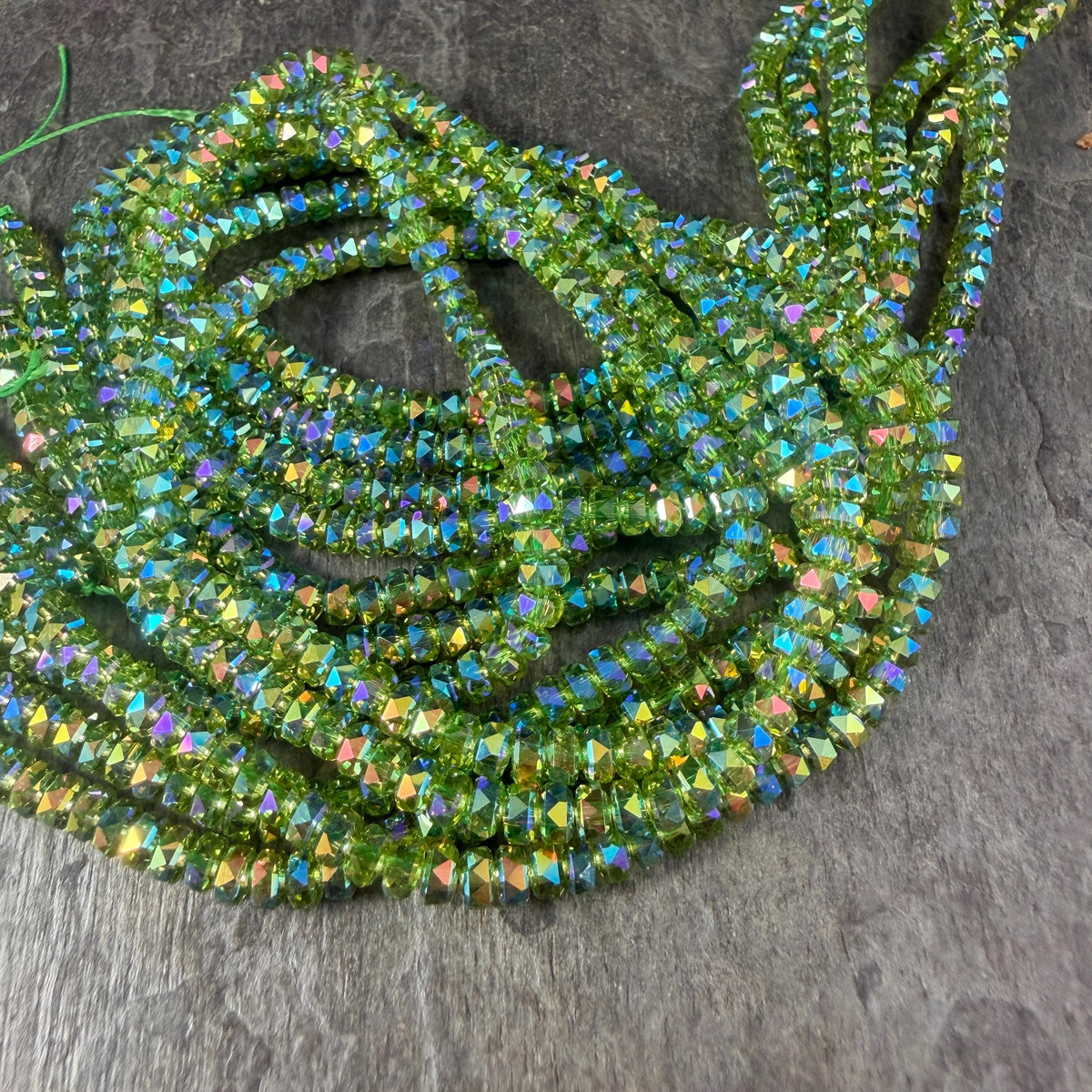 Faceted Glass Beads - 4x2.5mm Heishi Rondelles, Transparent Lime Green with Rainbow AB Finish (Lime-AB) * 7" Strand