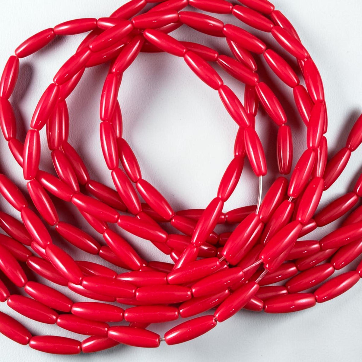 Skinny Oval, Rice Beads, 11.75x3.75mm Opaque Real Red (RO-Red) * 15" Strand