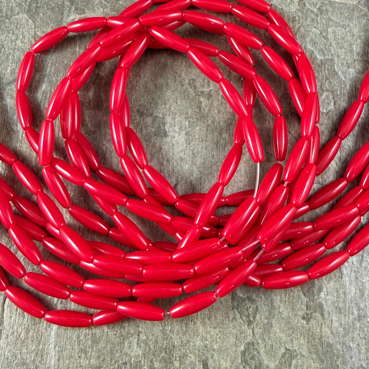 Skinny Oval, Rice Beads, 11.75x3.75mm Opaque Real Red (RO-Red) * 15" Strand