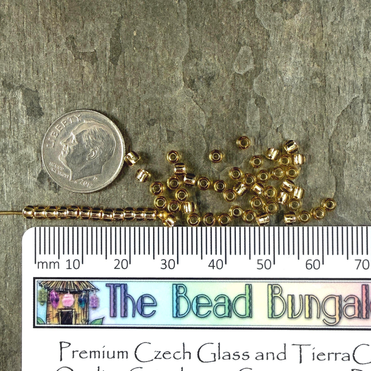 8/0 TOHO Glass Seed Beads, Rainbow Light Topaz, Black Lined (T8/SM-22) * 20 grams