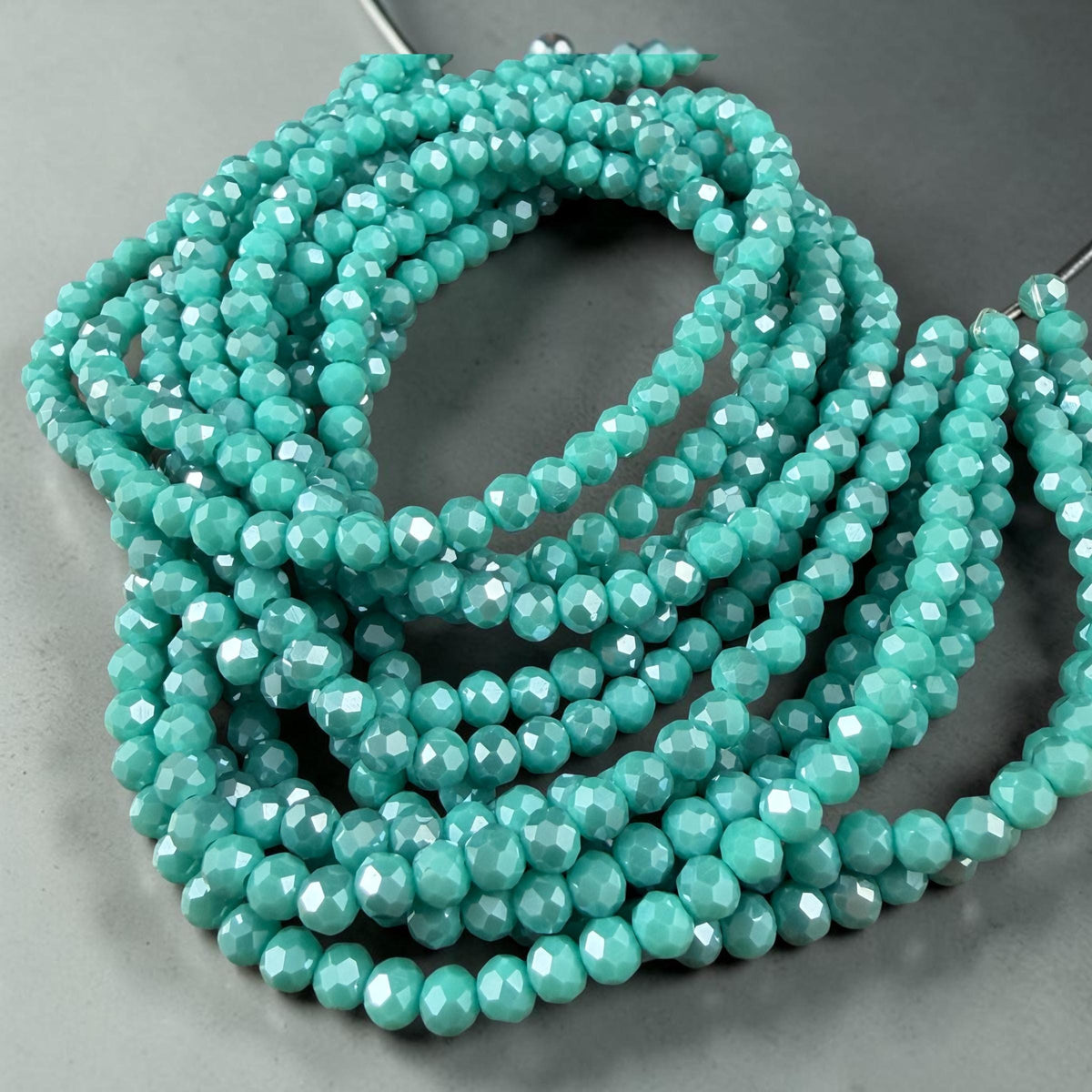 4x3mm Faceted Glass Beads, Dark Turquoise Blue with AB Finish (DkTurqAB-4) * 14" Strand