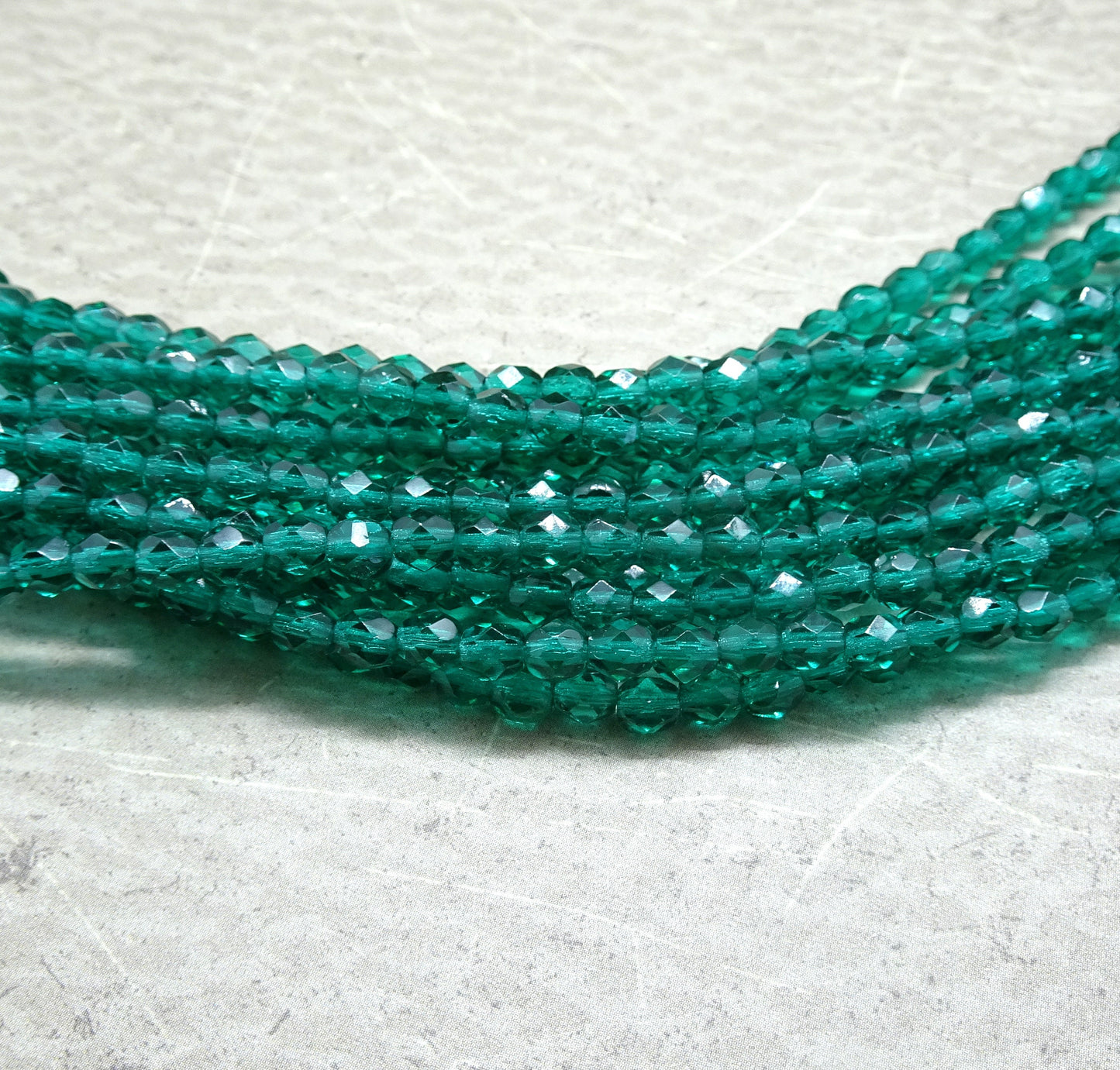 Czech Glass Beads - 4mm Emerald Green Glass Beads 4mm Faceted Round Czech Beads Transparent Emerald Green Beads (FP4/SM-5073) * Qty 50