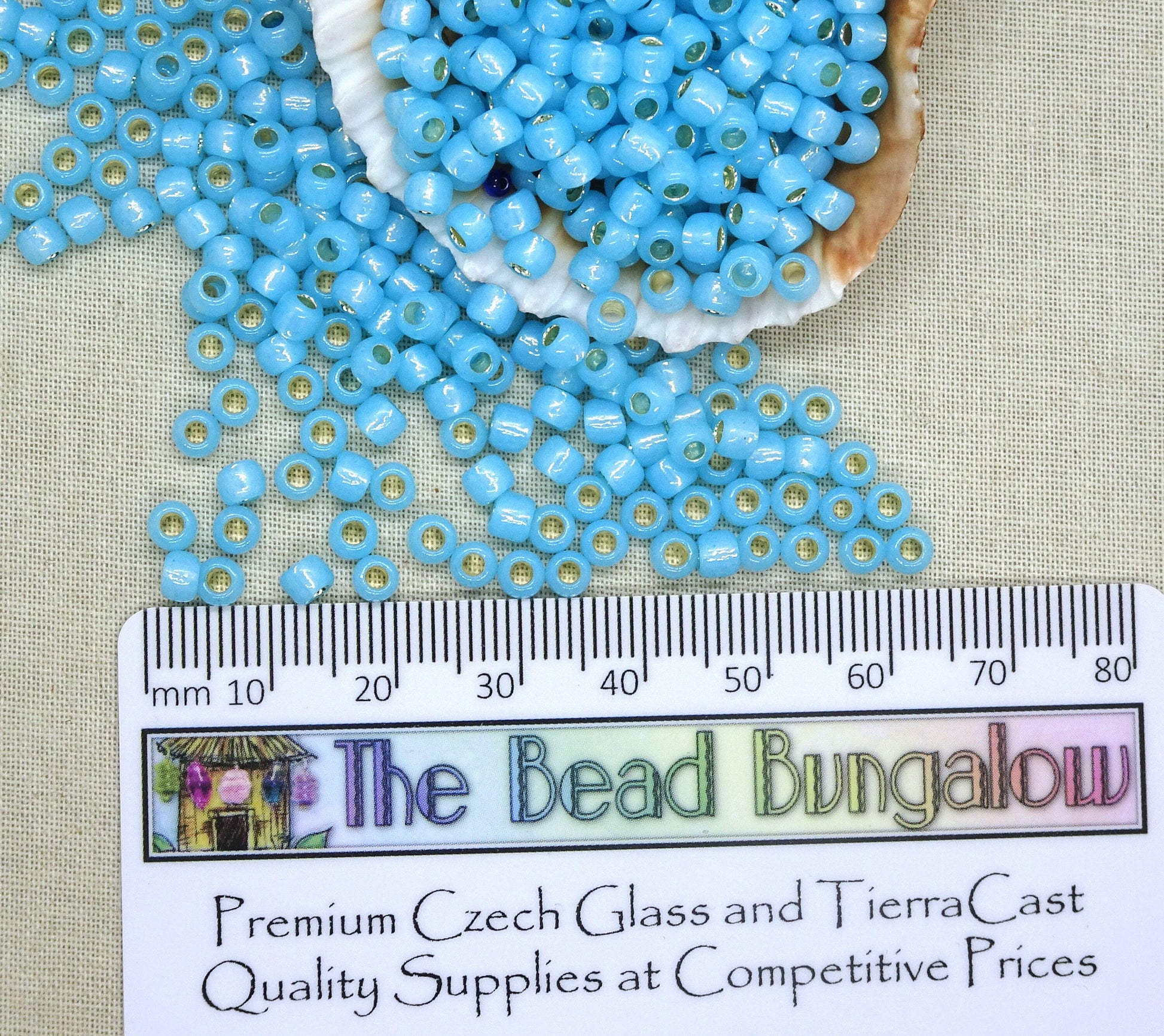 Milky Aqua Blue Glass Seed Beads TOHO 6/0 Round Blue Glass Beads with Silver Core (T6/SM-2117) 6/0 Seed Beads 4mm Beads * Qty. 10 grams