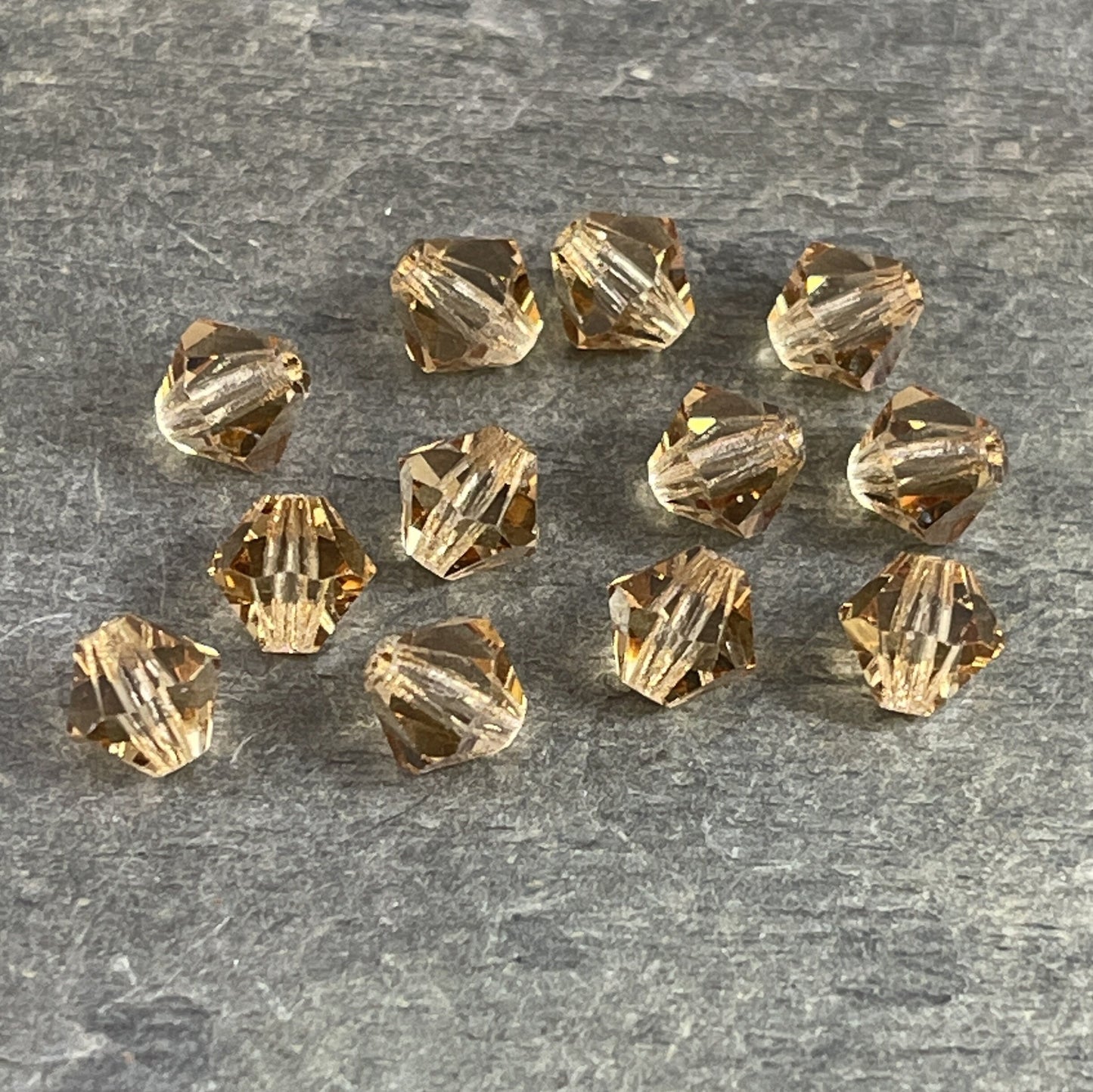 6mm Light Topaz Preciosa Crystal Bicone Beads Czech Glass Crystal 6mm Light Colorado Topaz Bicone Beads (FMG-3807) - Qty. 24 Beads