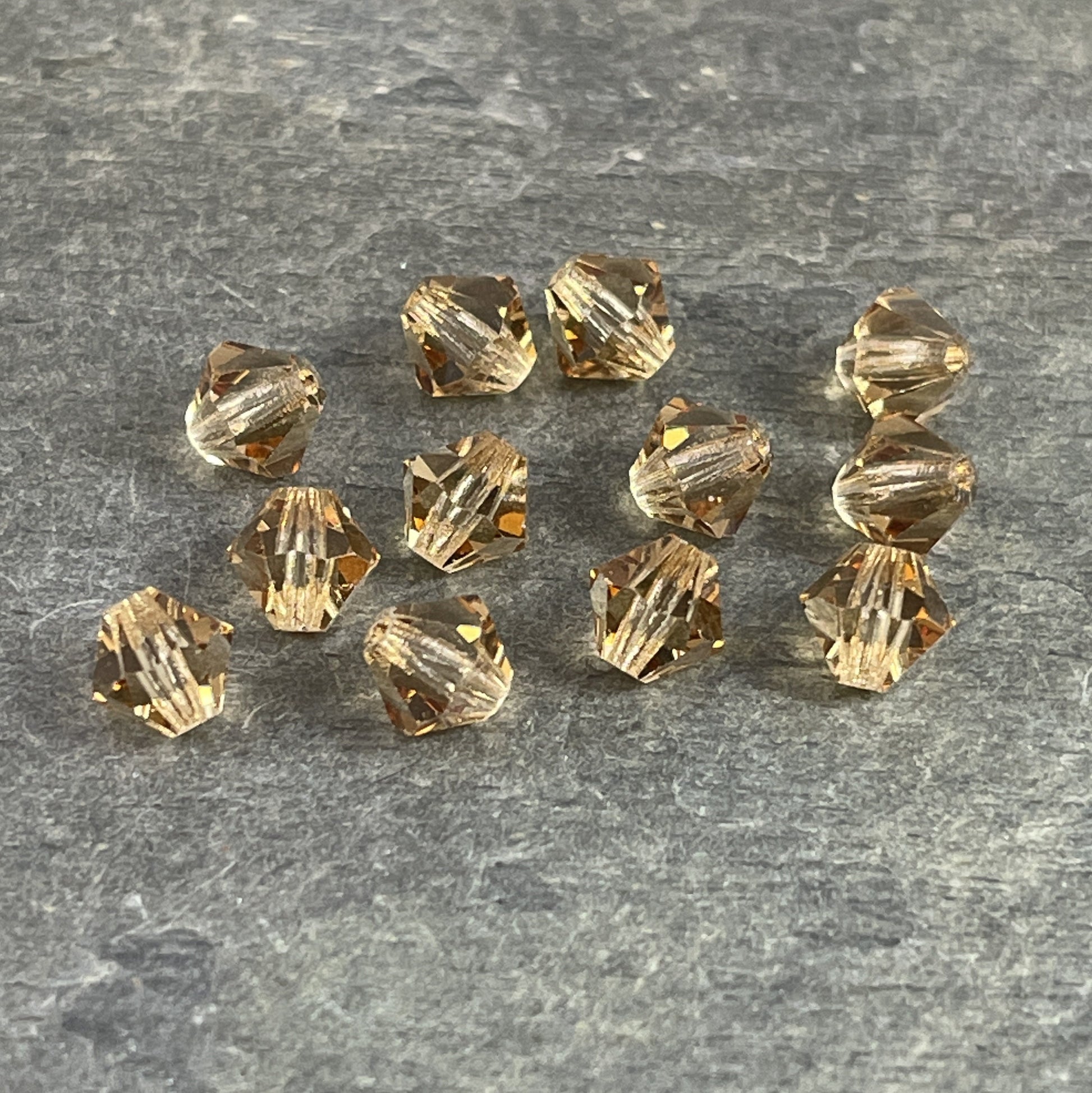 6mm Light Topaz Preciosa Crystal Bicone Beads Czech Glass Crystal 6mm Light Colorado Topaz Bicone Beads (FMG-3807) - Qty. 24 Beads