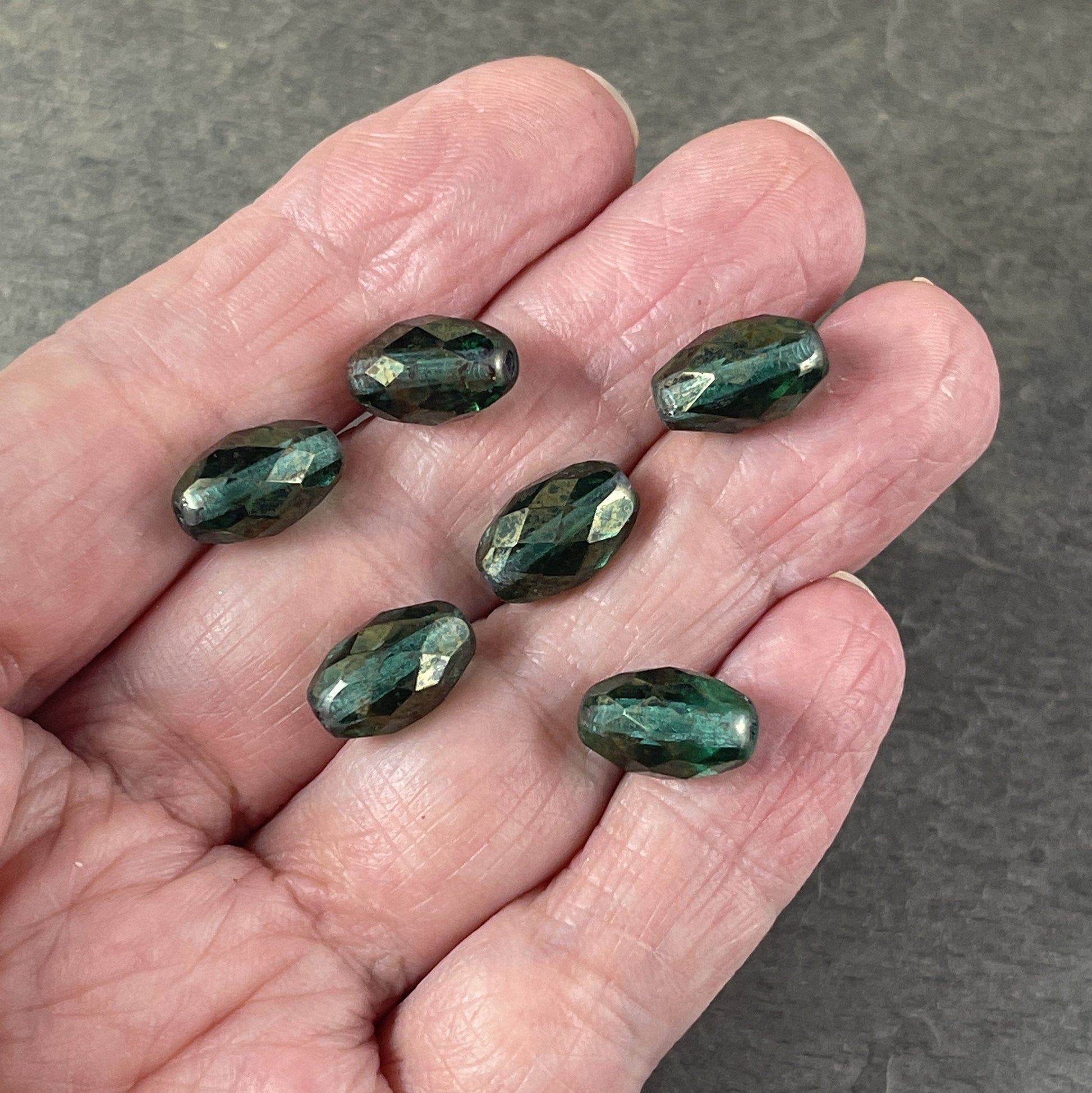 Emerald Green Faceted Oval Beads, Transparent Green with Golden Luster, 12mm Oval Beads (FOV/N-1222) *