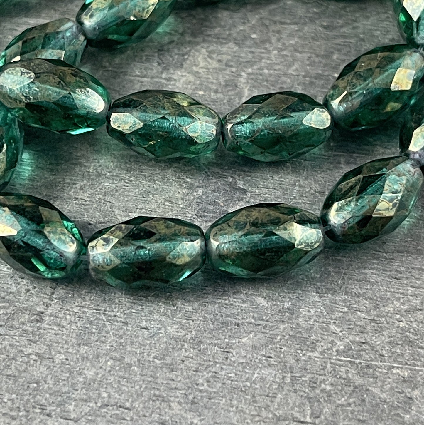 Emerald Green Faceted Oval Beads, Transparent Green with Golden Luster, 12mm Oval Beads (FOV/N-1222) *