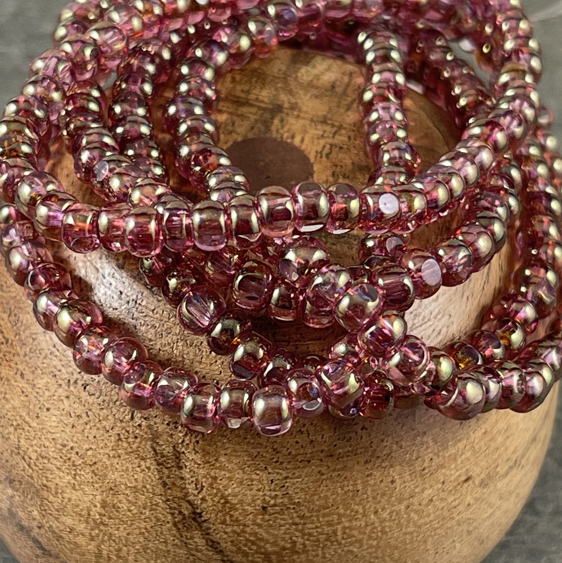 Czech Glass Beads Golden Fuchsia Faceted Seed Bead 4x3mm Transparent Fuchsia with Golden Luster Tri-cut Beads (TRICA/RJ-2630) * Qty. 50