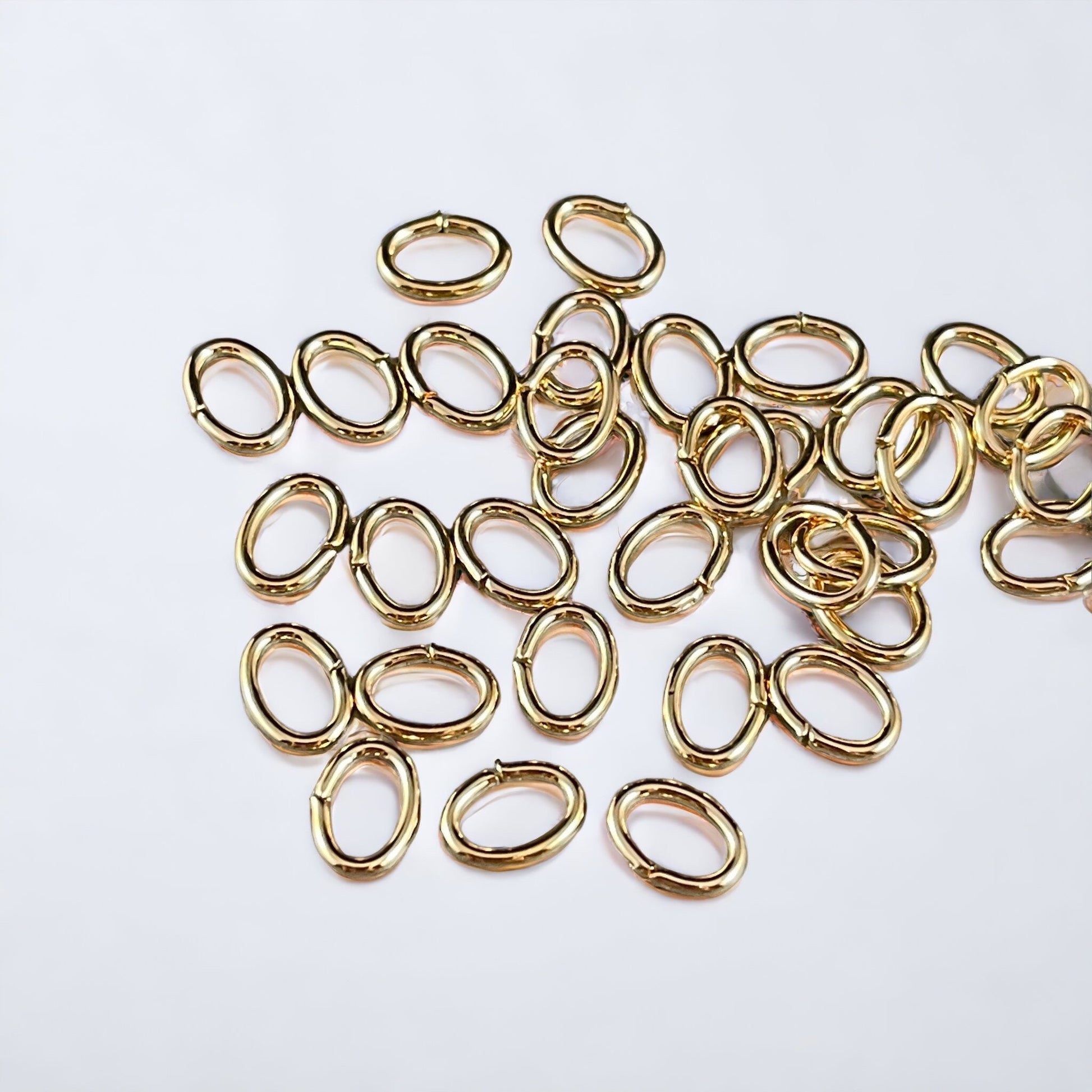 Gold Oval Shape Jump Rings ~ 7x5mm Oval Jump Rings ~ 18g Oval Jump Rings ~ Gold Plated Brass Open Jump Rings (FMG/5156) * Qty. 100