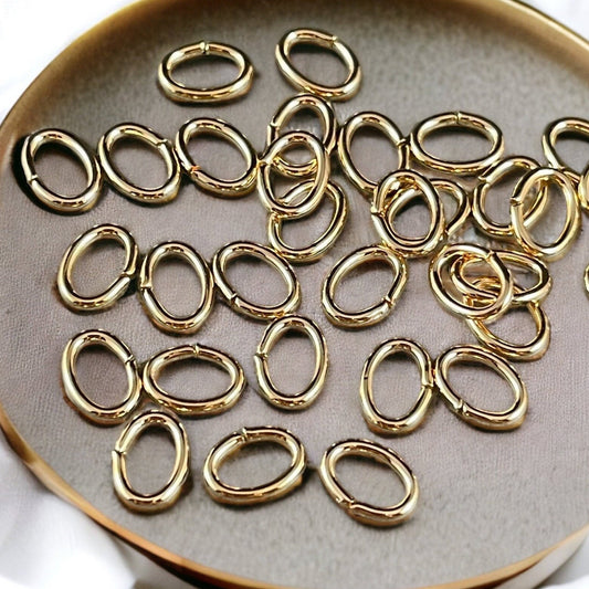 Gold Oval Shape Jump Rings ~ 7x5mm Oval Jump Rings ~ 18g Oval Jump Rings ~ Gold Plated Brass Open Jump Rings (FMG/5156) * Qty. 100